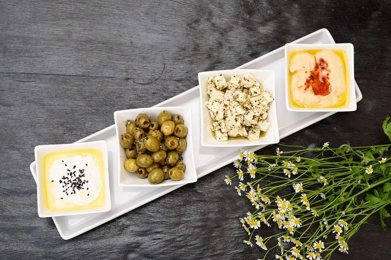Vegane Käsesoße über Kartoffelecken